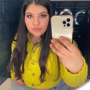 Love the color on this warm top!